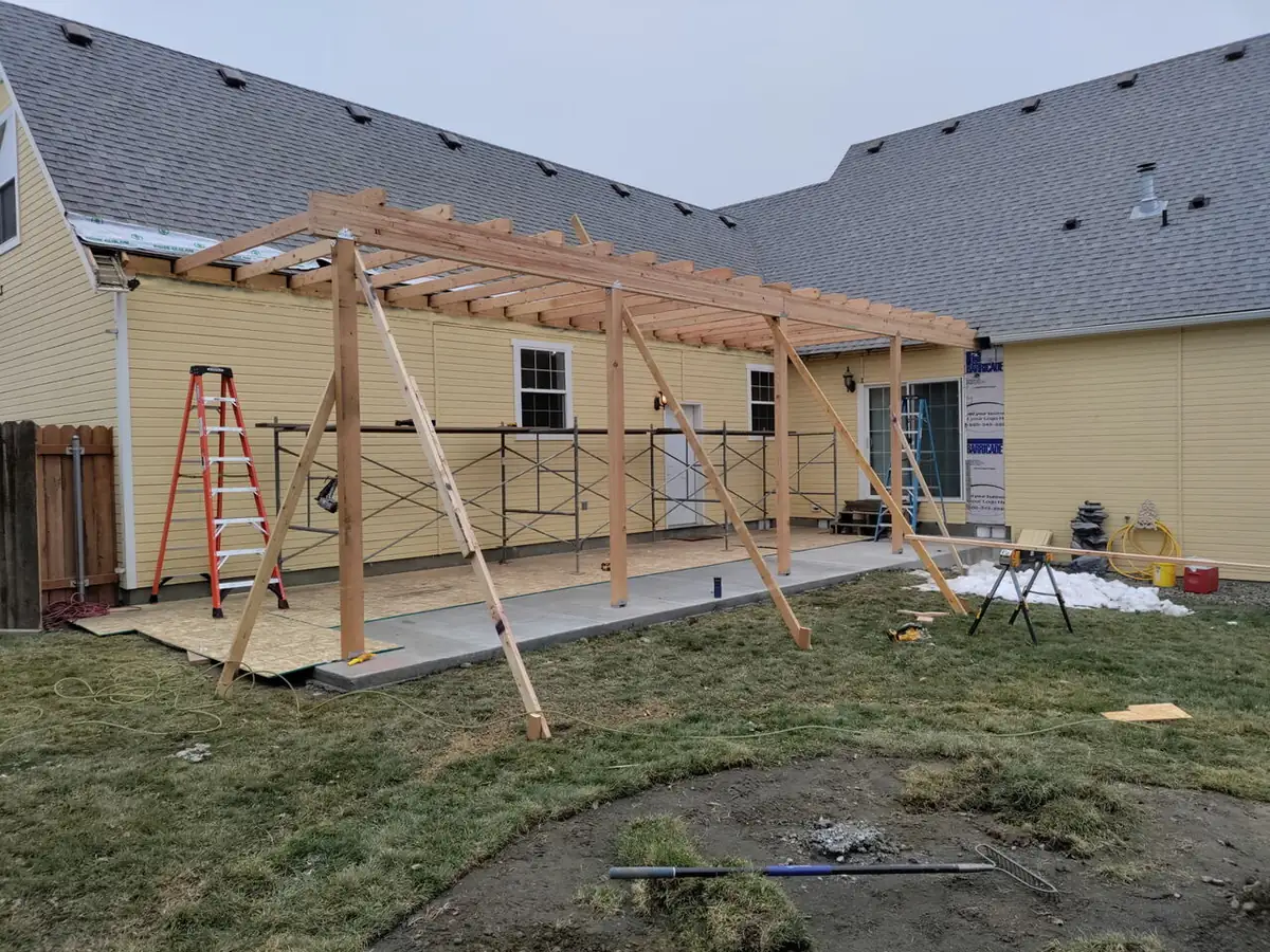Before: backyard patio cover framing in progress