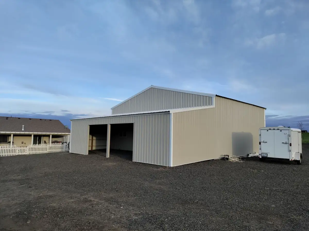 After: finished metal pole barn with open bays