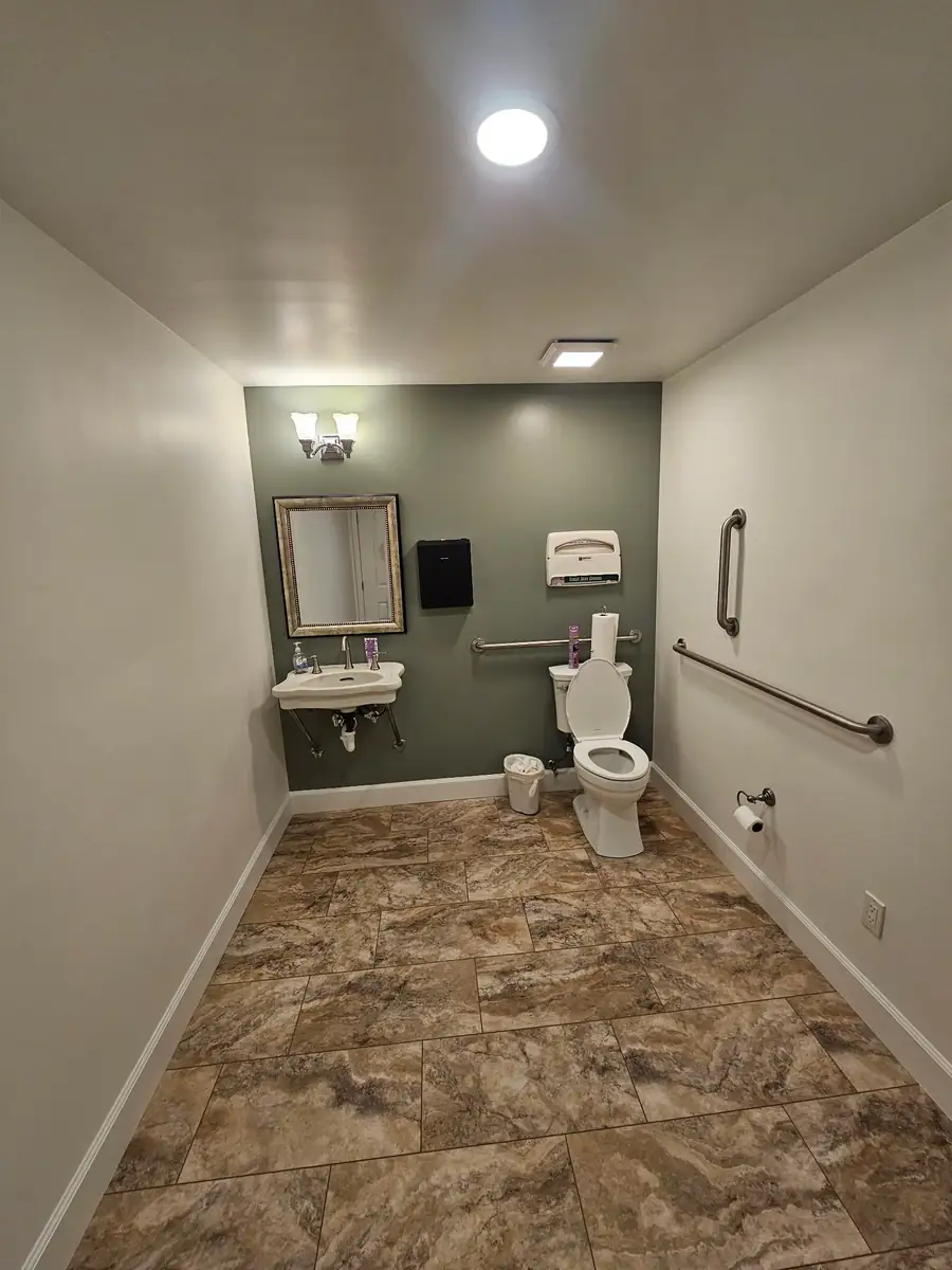 Finished first bathroom after dividing one large bathroom into two