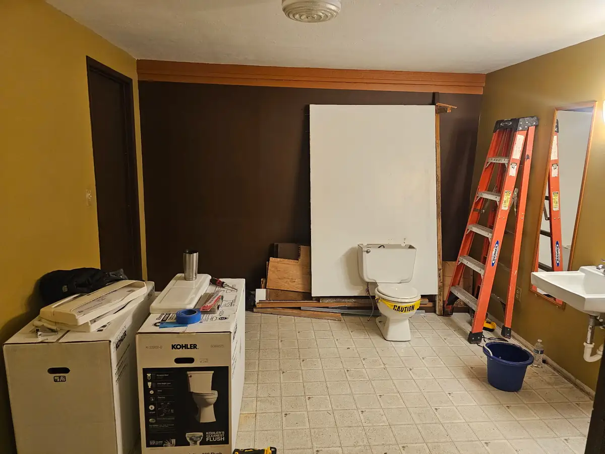 Original large bathroom before conversion