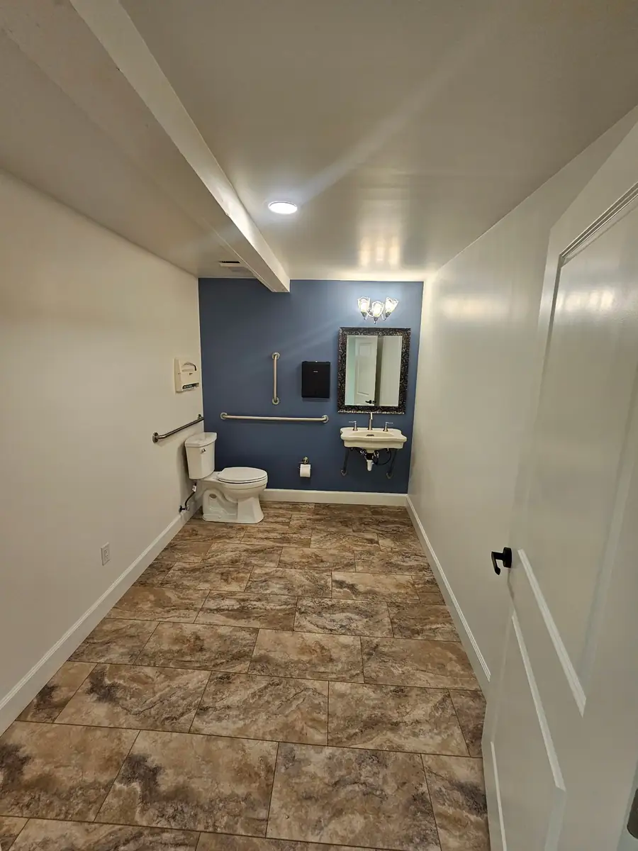 Finished second bathroom after dividing one large bathroom into two